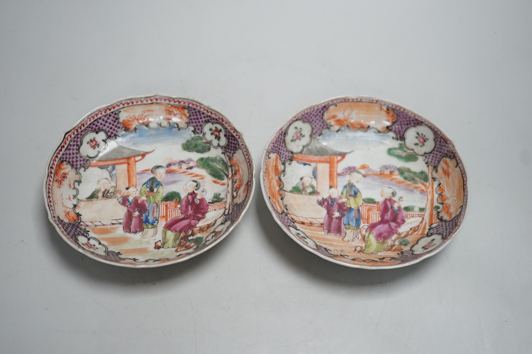 A pair of late 18th century Chinese export famille rose tea bowls and saucers. Saucers 13.5cm